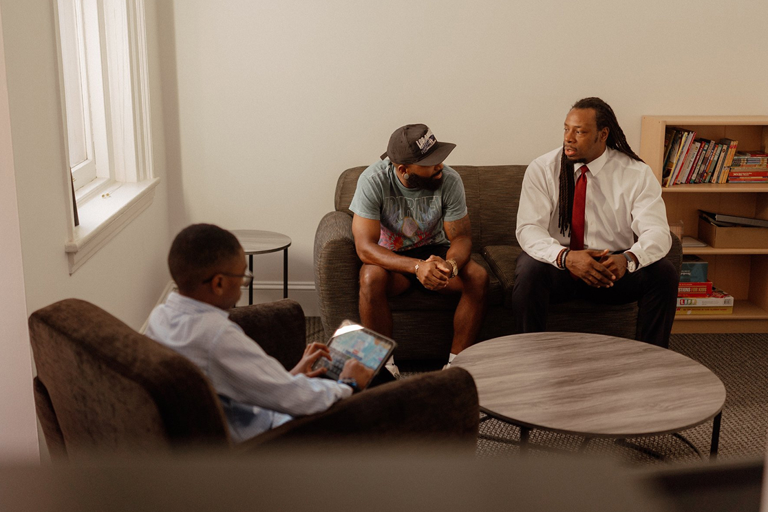 Experienced lawyer talking to client during family law consultation